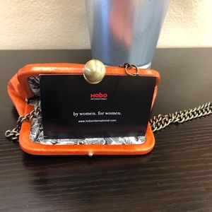 Hobo orange small cross body bag